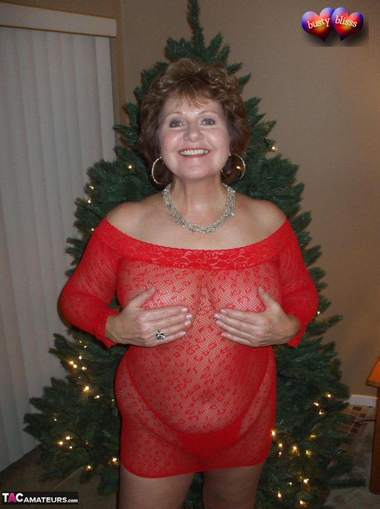 Busty Granny gets her massive boobs out